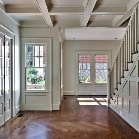 Coffered ceiling and custom trim in an entry